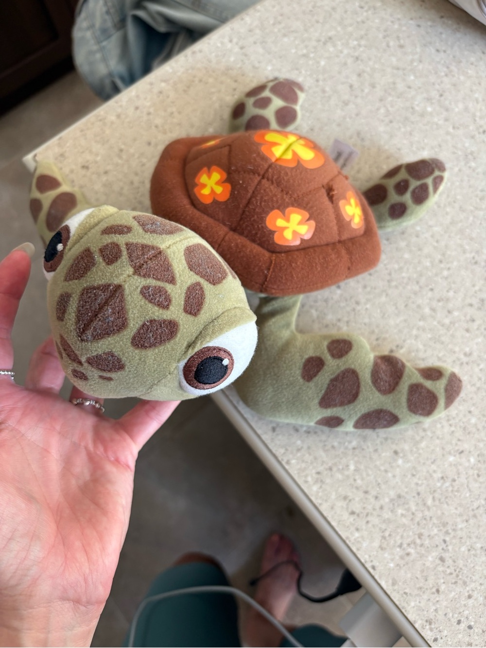 Disney nemo Green & Brown Sea Turtle Plush with Yellow-Orange Flower Accents